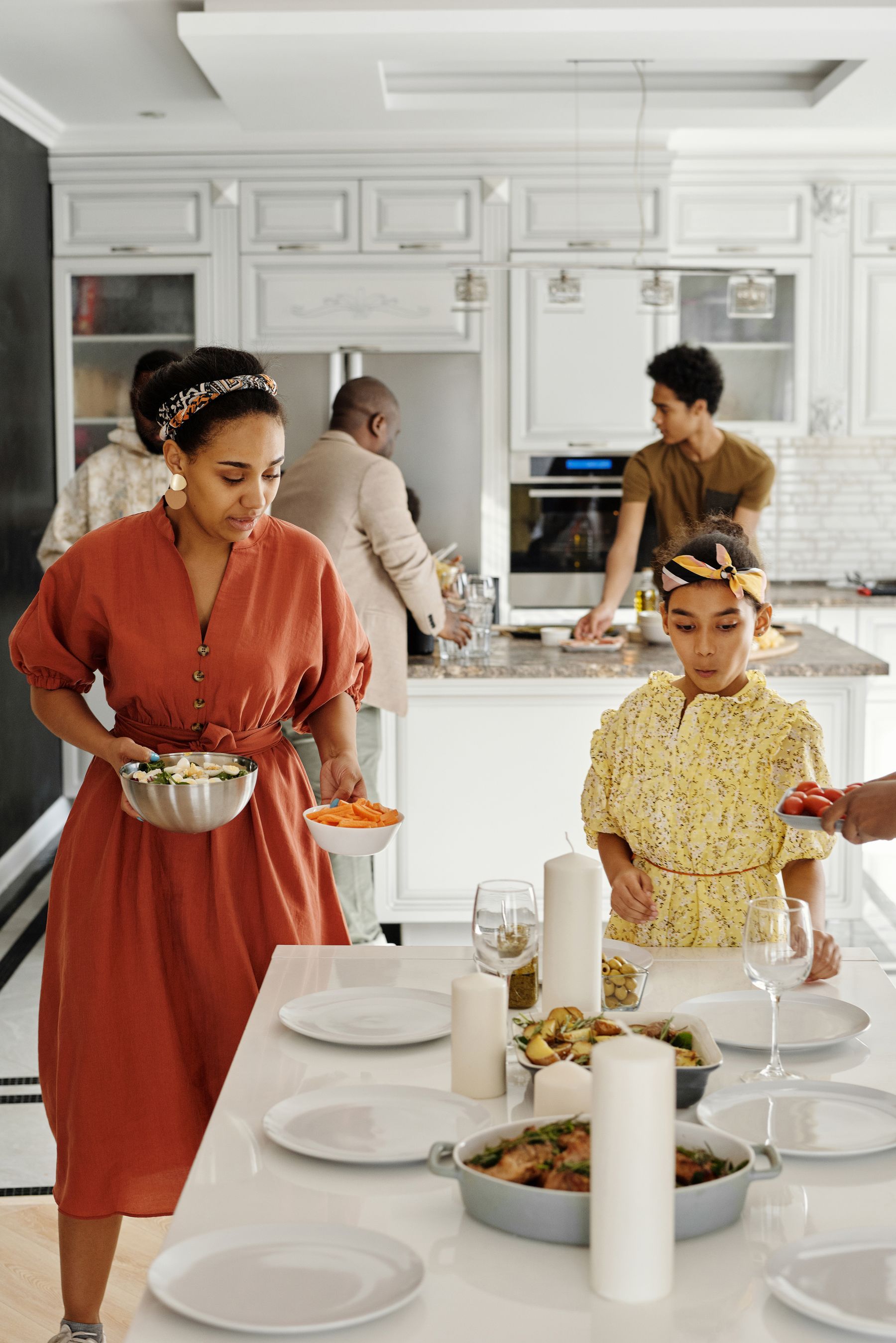 A family cooking together in the kitchen